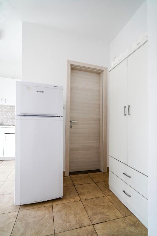 Kuchyň nebo kuchyňský kout v ubytování Dimitra Beach Apartments - Nea Karvali Kavala