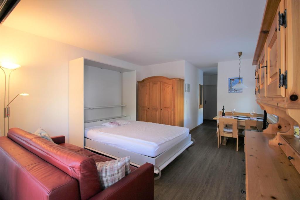 Postel nebo postele na pokoji v ubytování Zuhause in den Alpen Ihre Ferienwohnung mit Hallenbad und Sauna