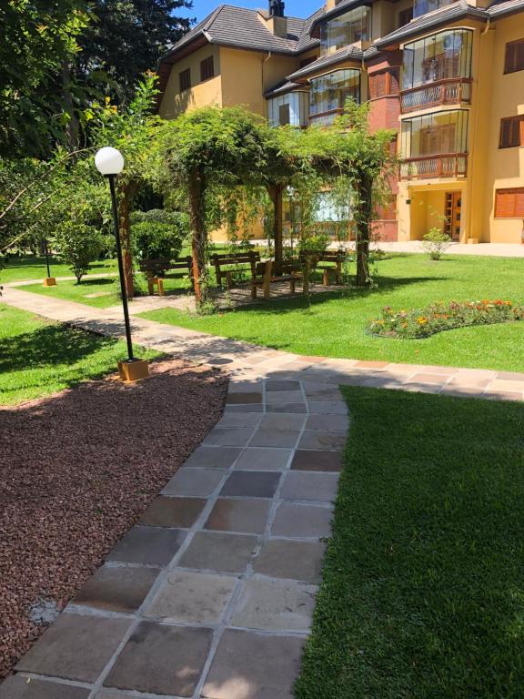 APARTAMENTO A UMA QUADRA DO HARD ROCK CAFÉ GRAMADO  APARTAMENTO A UMA QUADRA DO HARD ROCK CAFÉ GRAMADO