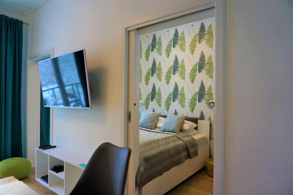 TV a/nebo společenská místnost v ubytování Enklawa Białowieska Forest & Spa