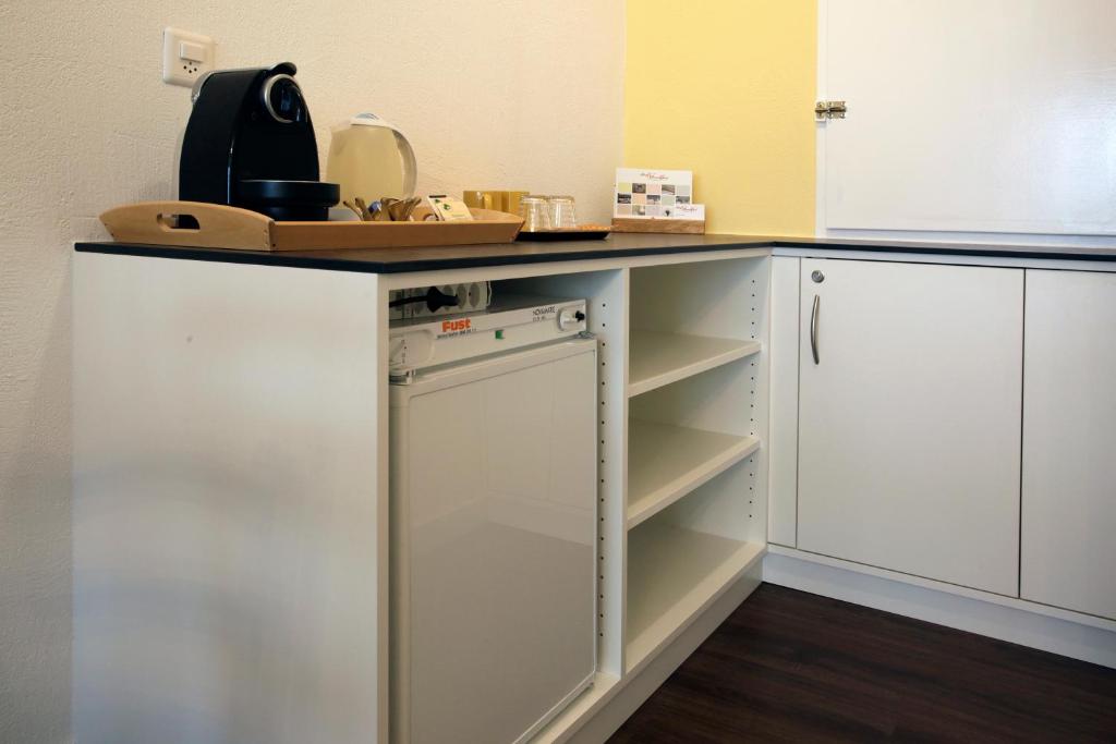 Kuchyň nebo kuchyňský kout v ubytování B&B Siglistorf