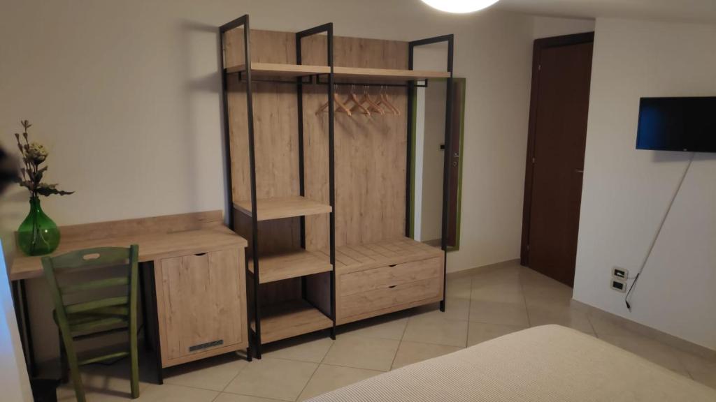 Postel nebo postele na pokoji v ubytování B&B Tra Gli Ulivi