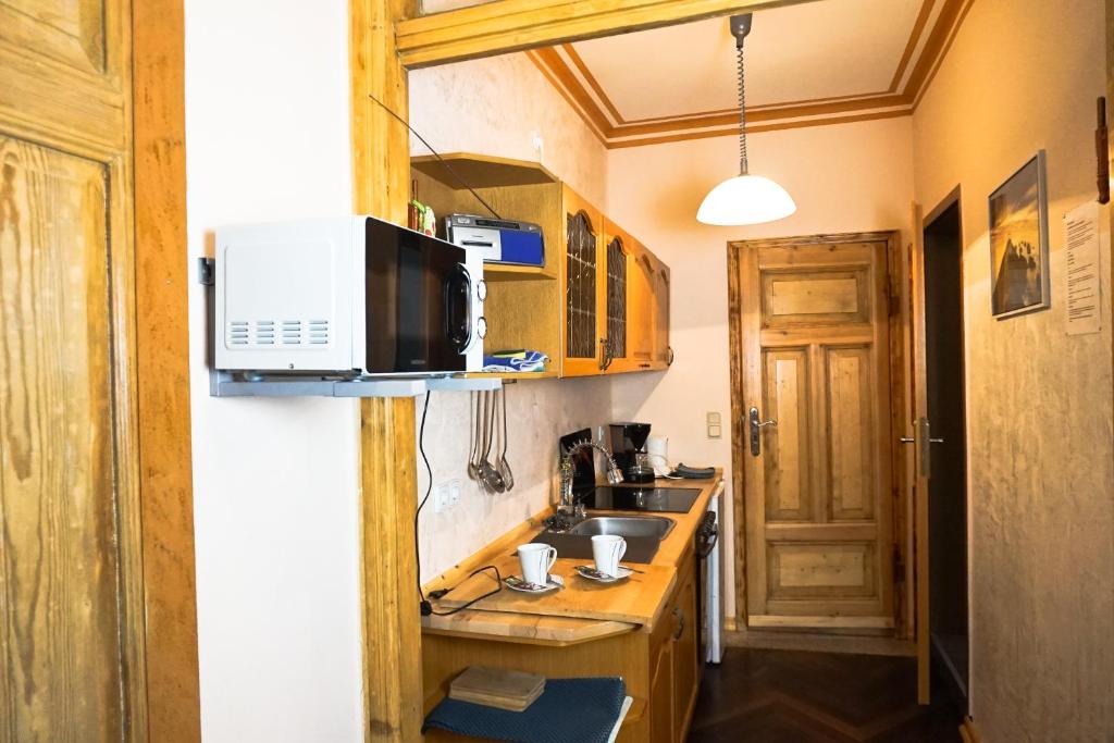 Kuchyň nebo kuchyňský kout v ubytování Alte Mühle Kelbra - ehemalig ALBIG