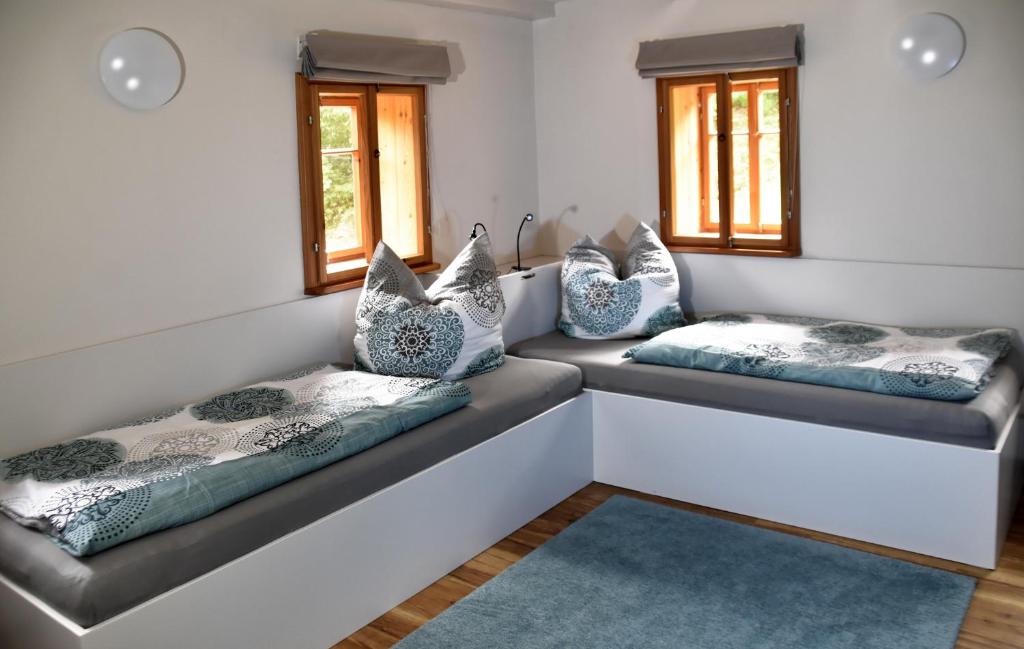 Postel nebo postele na pokoji v ubytování Urlaub im 200 Jahre alten Fachwerkhaus
