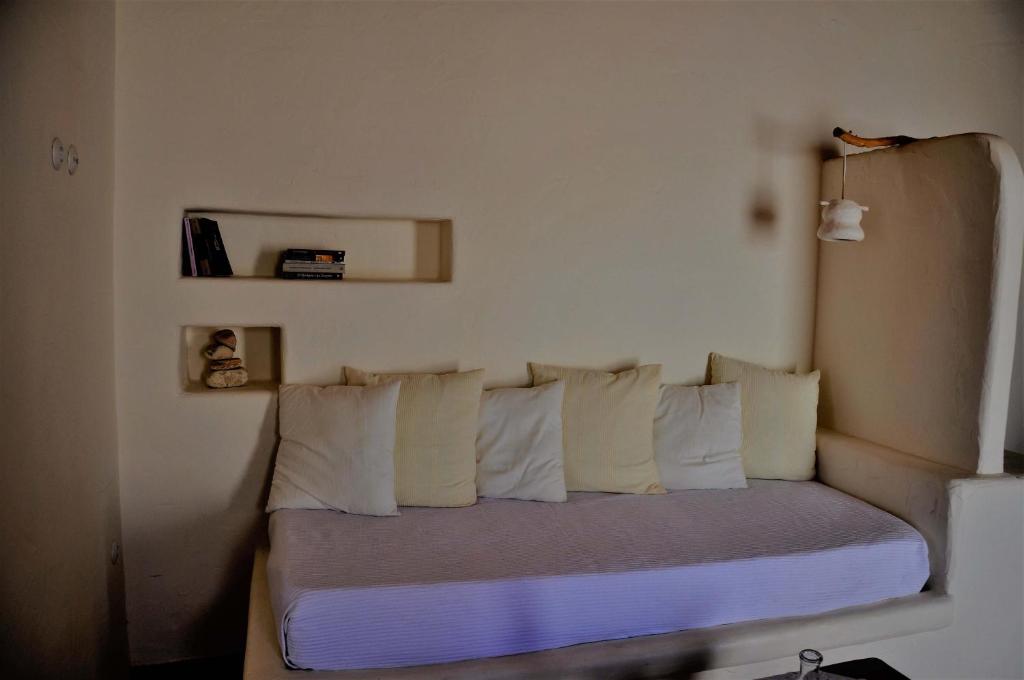 Postel nebo postele na pokoji v ubytování Pambelos Lodge