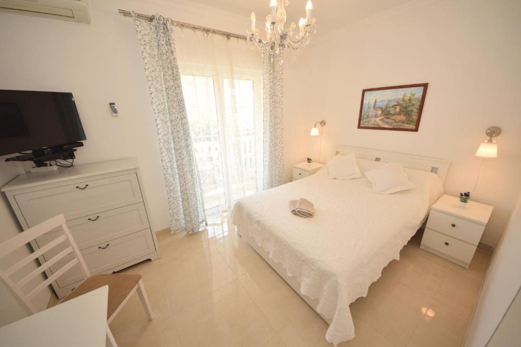 Posteľ alebo postele v izbe v ubytovaní Apartments Cale