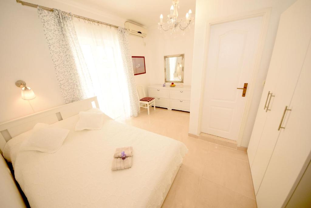 Posteľ alebo postele v izbe v ubytovaní Apartments Cale