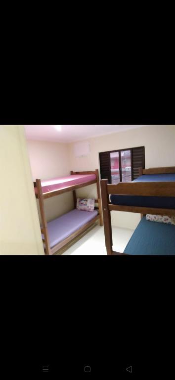  Apto Toninhas pé na Areia