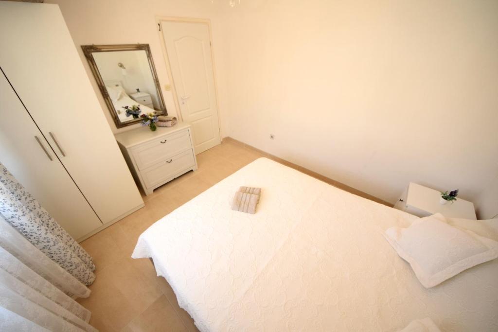 Posteľ alebo postele v izbe v ubytovaní Apartments Cale