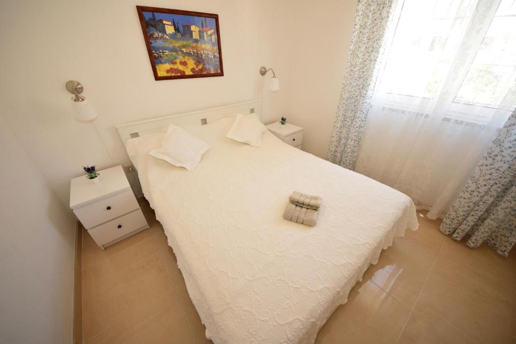 Posteľ alebo postele v izbe v ubytovaní Apartments Cale