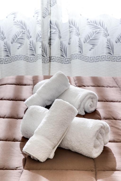A bed or beds in a room at Ariston - Ciclabile Appartamento in CENTRO al mare con balcone