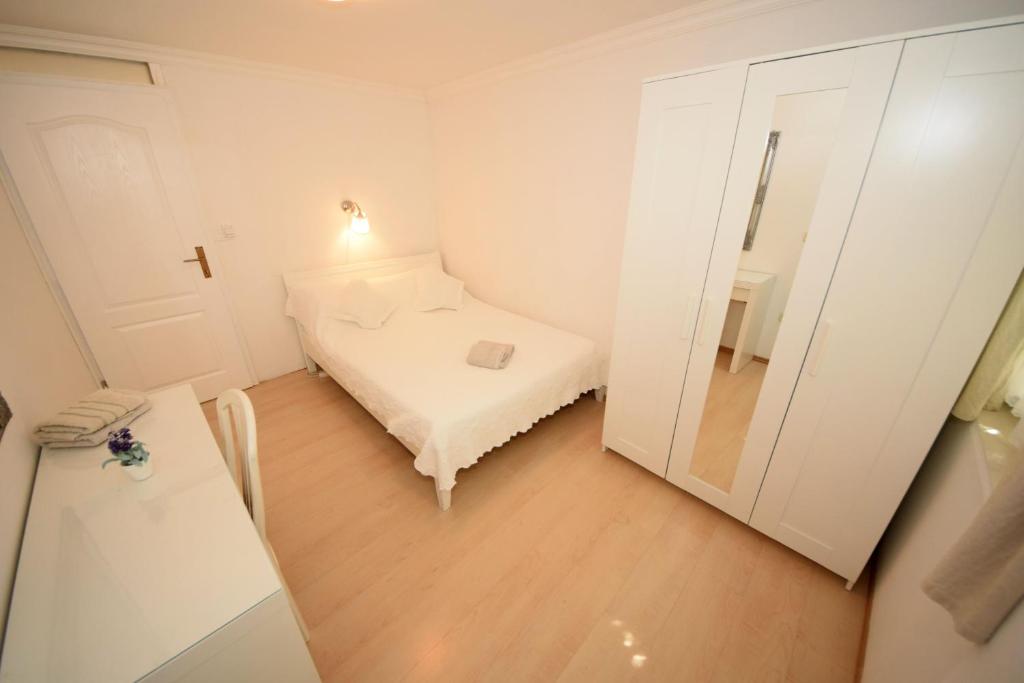 Posteľ alebo postele v izbe v ubytovaní Apartments Cale