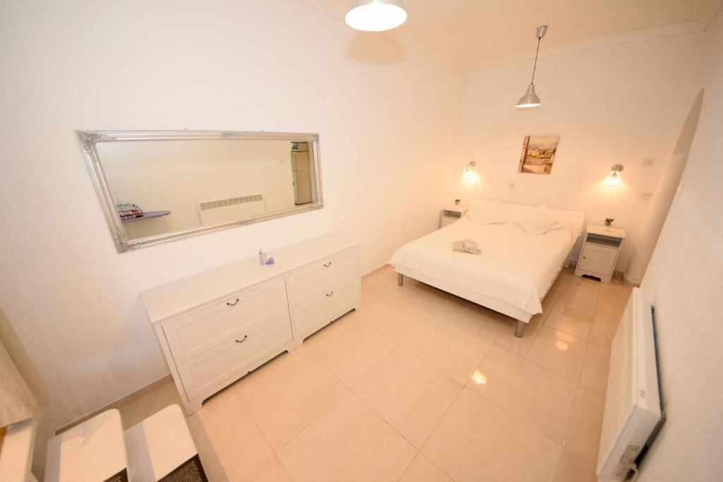 Posteľ alebo postele v izbe v ubytovaní Apartments Cale