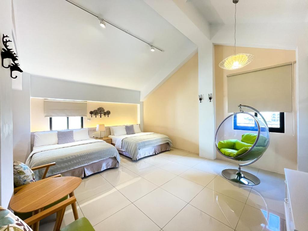 Un pat sau paturi într-o cameră la Annong White House