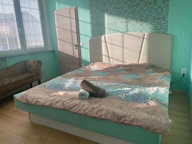 Postel nebo postele na pokoji v ubytování Room Oaza Miru