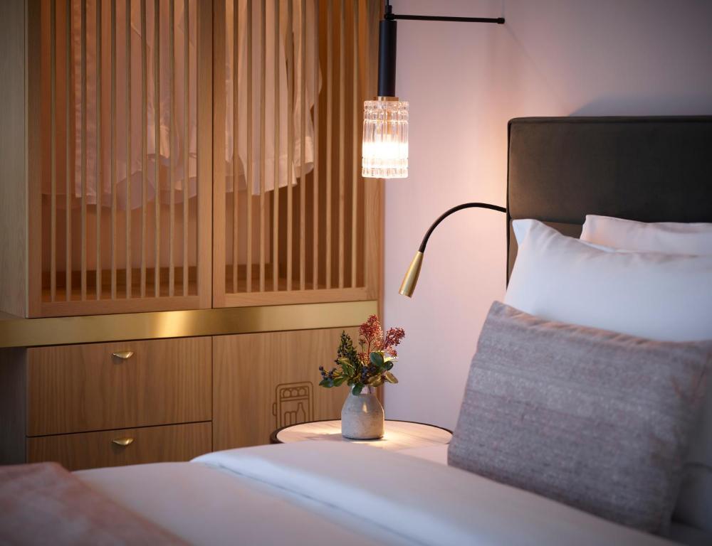 Postel nebo postele na pokoji v ubytování SAY HOTEL