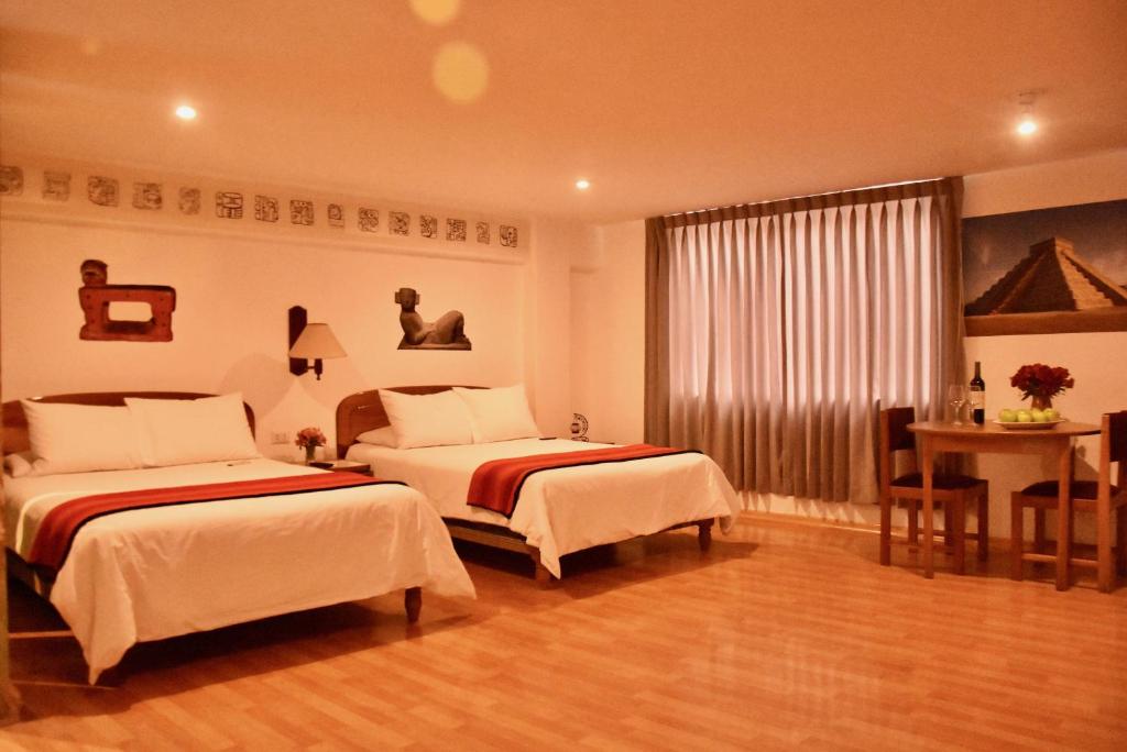 Postel nebo postele na pokoji v ubytování Los Aticos B&B with Coworking