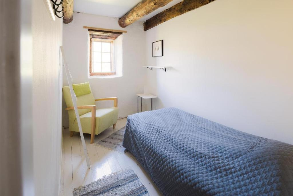 Postel nebo postele na pokoji v ubytování Liste Gård