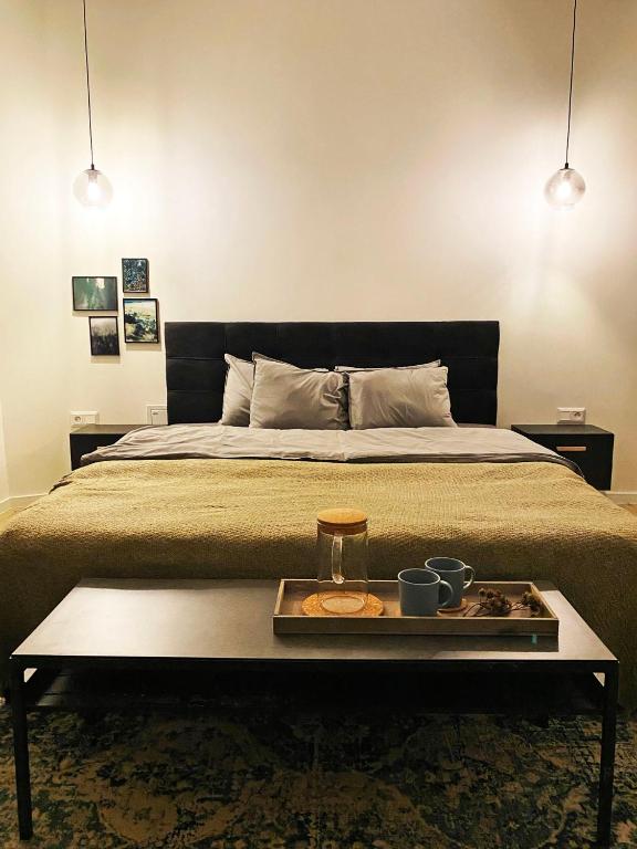 Postel nebo postele na pokoji v ubytování Apartmány Elli