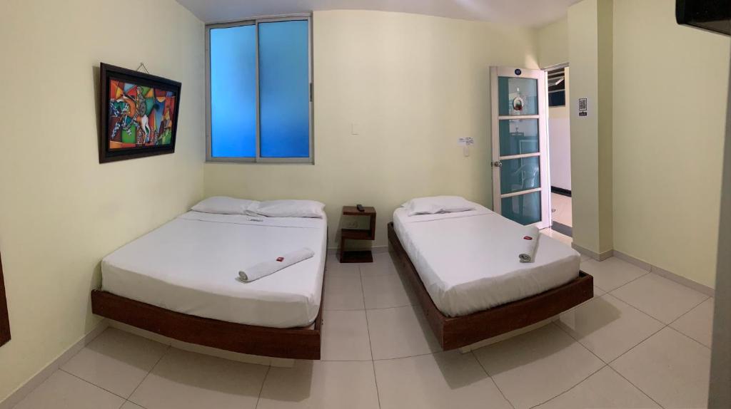 Postel nebo postele na pokoji v ubytování Hotel Bellavista Premium