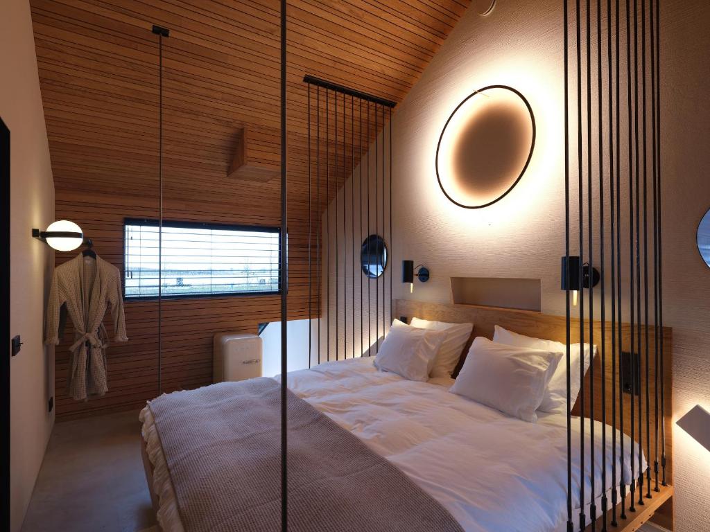 Postel nebo postele na pokoji v ubytování vondice hotel