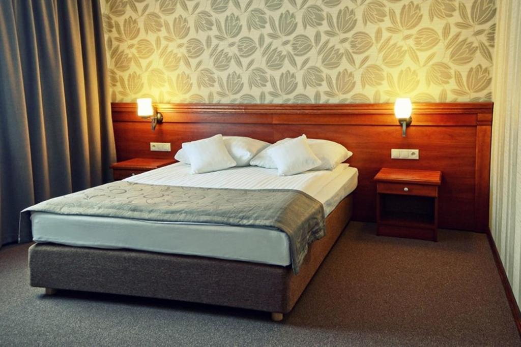 Posteľ alebo postele v izbe v ubytovaní Hotel Jamajka & SPA