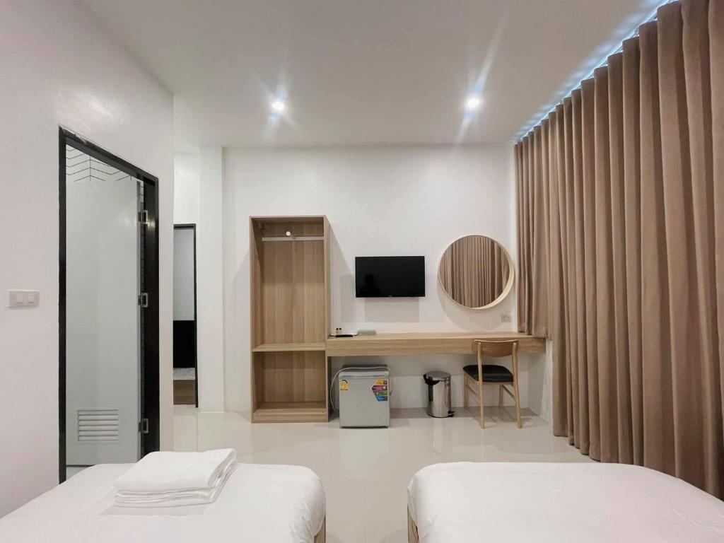 Postel nebo postele na pokoji v ubytování Topnorth Hotel Maesai