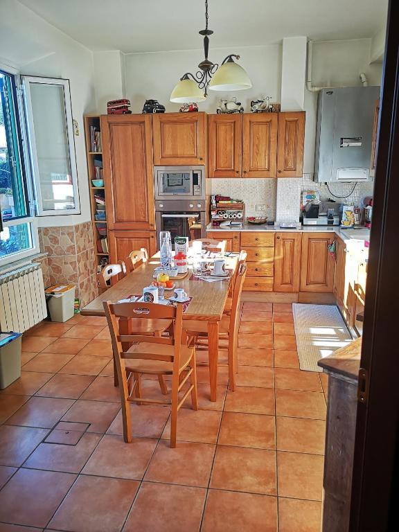 Kuchyň nebo kuchyňský kout v ubytování Vecchia Roma Resort