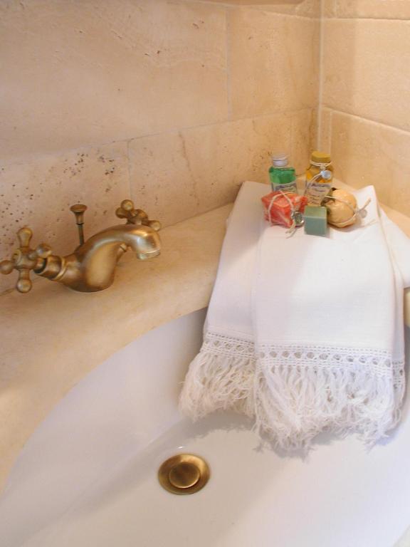 Postel nebo postele na pokoji v ubytování Albergo Il Giglio