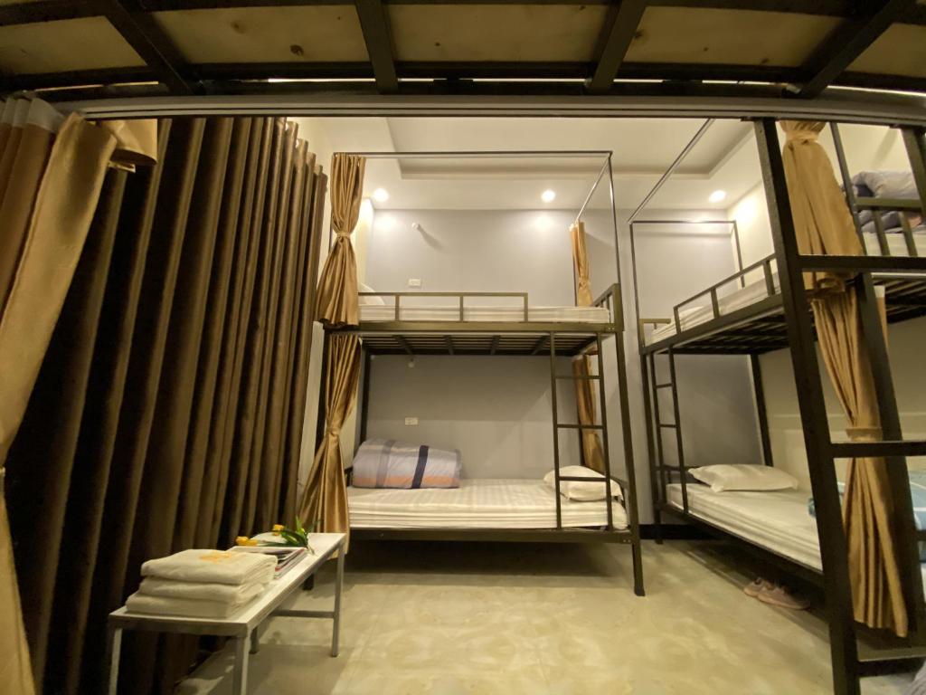 Postel nebo postele na pokoji v ubytování Ha Giang Ali Hostel