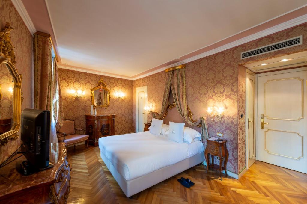 Postelja oz. postelje v sobi nastanitve Hotel Antico Doge - a Member of Elizabeth Hotel Group