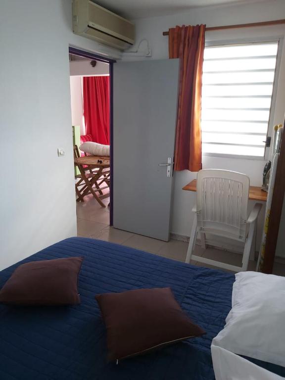 Postel nebo postele na pokoji v ubytování Gîte Muskad
