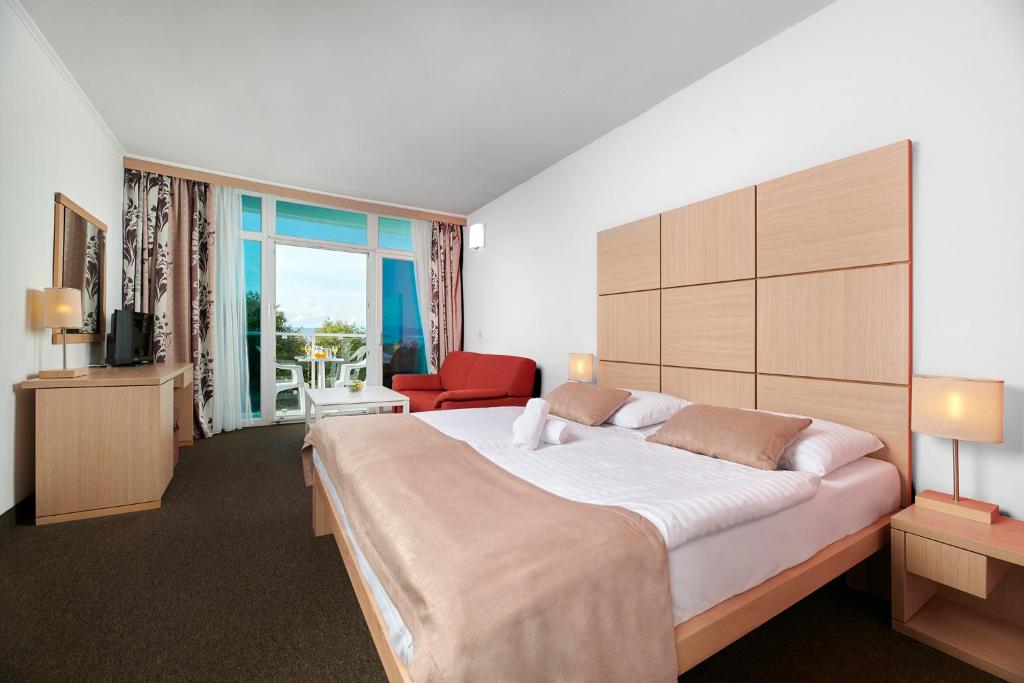 Postel nebo postele na pokoji v ubytování Magal Maradiso Hotel by Aminess