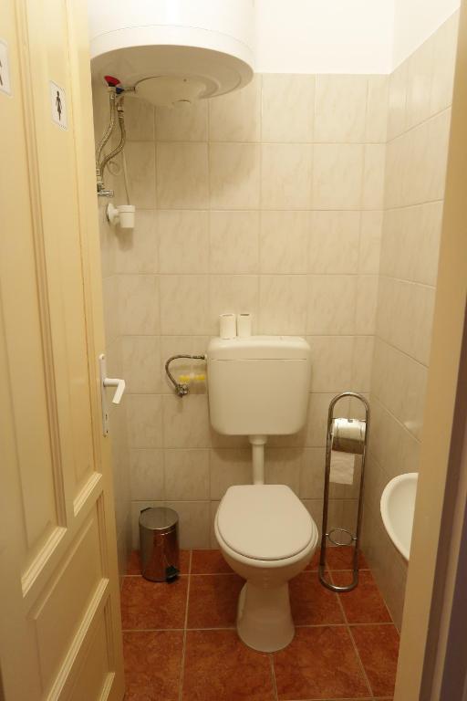 Koupelna v ubytování Éva Apartman