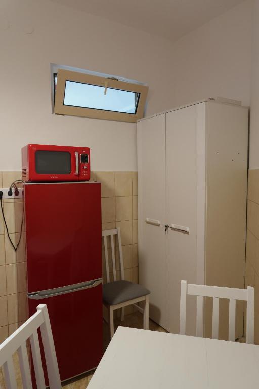 Kuchyň nebo kuchyňský kout v ubytování Éva Apartman