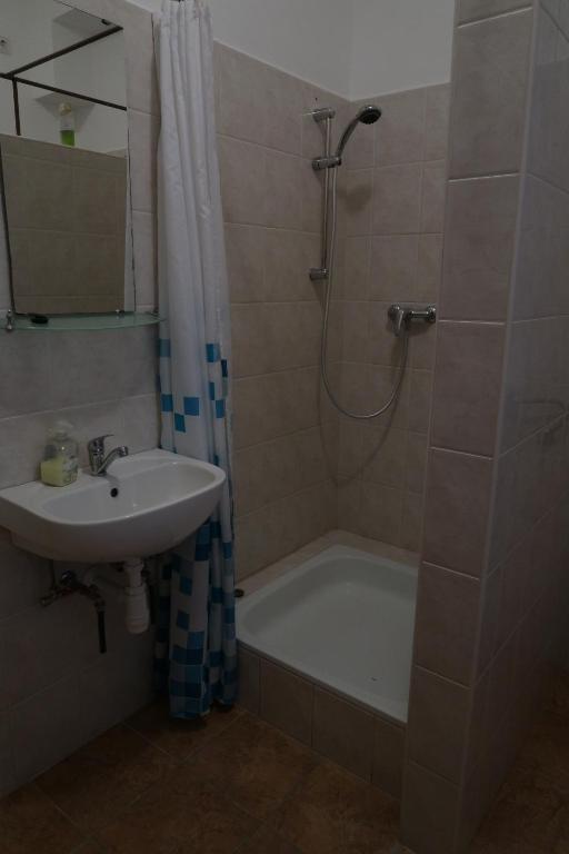 Koupelna v ubytování Éva Apartman