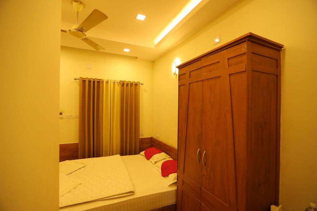 Postel nebo postele na pokoji v ubytování SAPPHIRE INN
