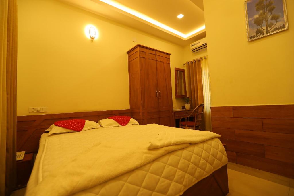 Postel nebo postele na pokoji v ubytování SAPPHIRE INN