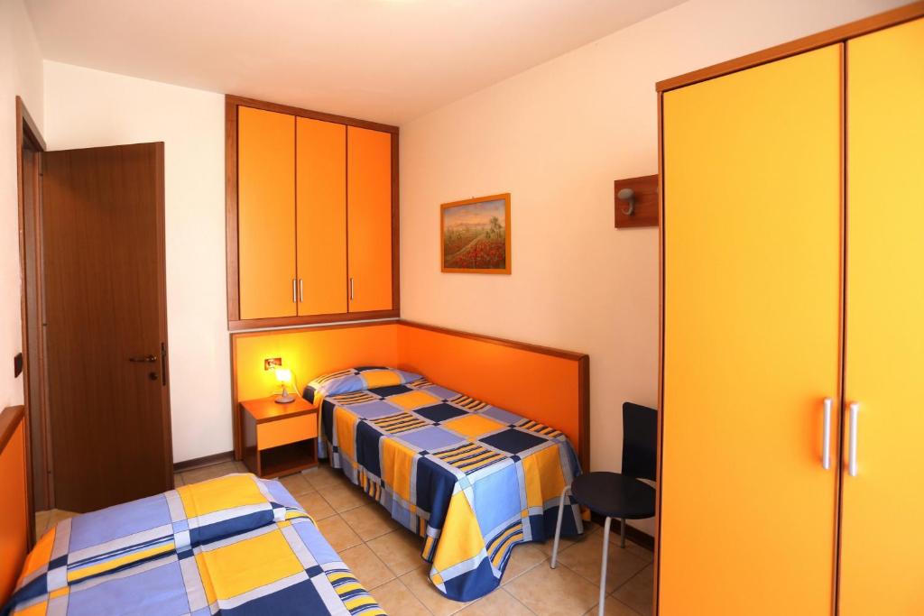 Posteľ alebo postele v izbe v ubytovaní Quercia Lido Altanea