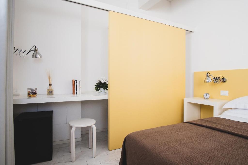 Postel nebo postele na pokoji v ubytování Casa Fola - City Centre Rooms