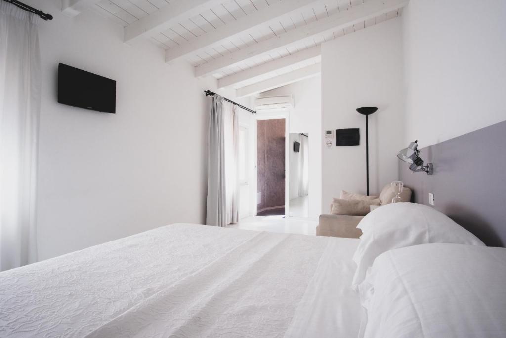Postel nebo postele na pokoji v ubytování Casa Fola - City Centre Rooms