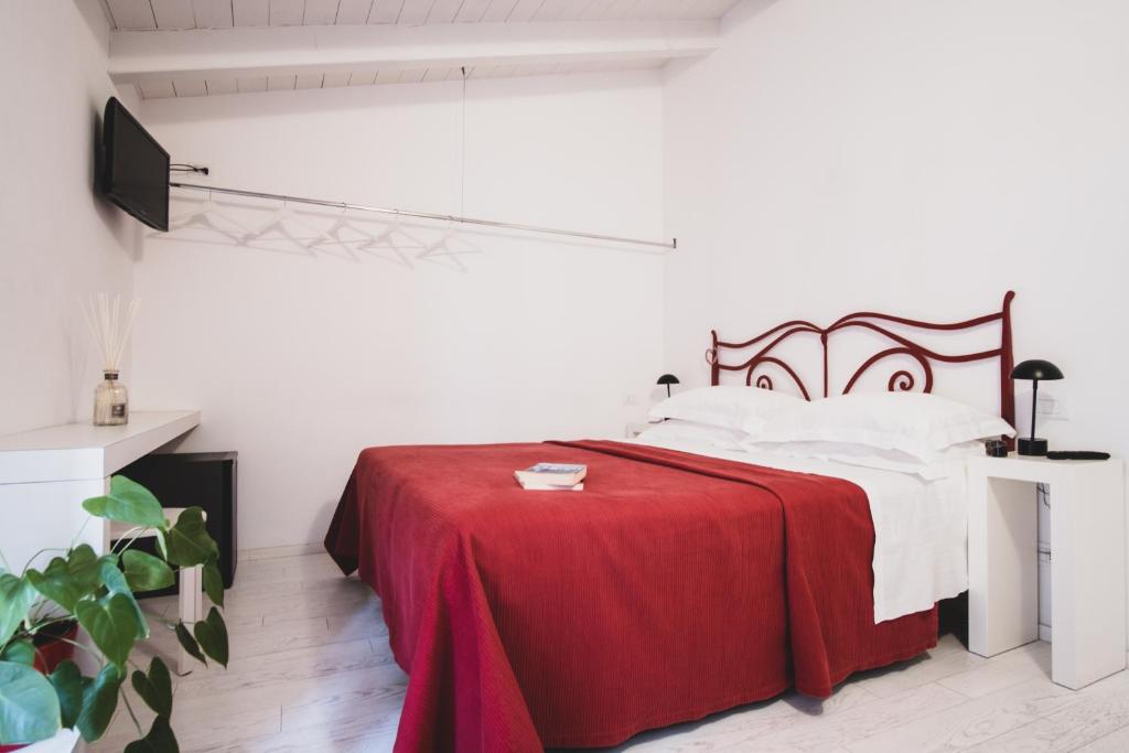 Postel nebo postele na pokoji v ubytování Casa Fola - City Centre Rooms