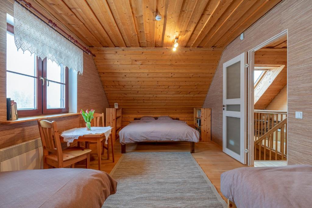Postel nebo postele na pokoji v ubytování RosenHausen Puhkemajad