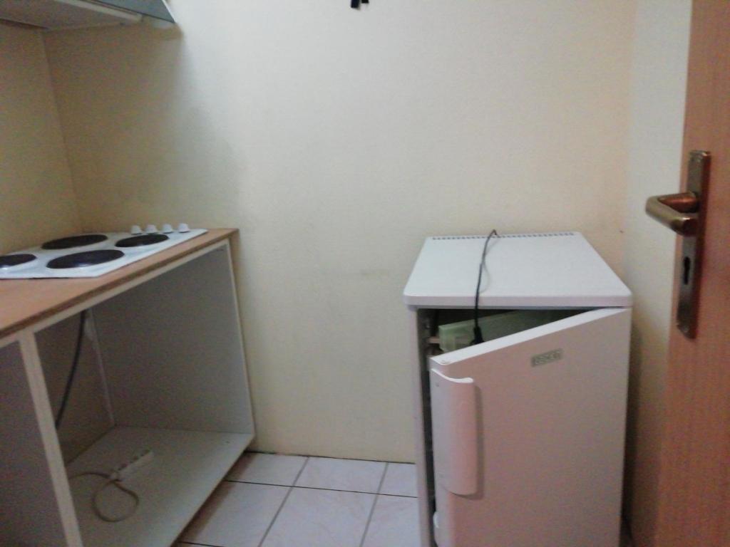 Kuchyň nebo kuchyňský kout v ubytování Hotel Dry Les Courtis