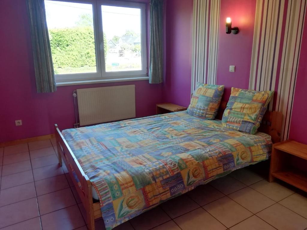 Postel nebo postele na pokoji v ubytování Hotel Dry Les Courtis