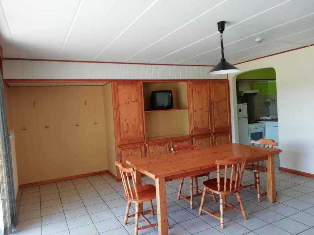 Kuchyň nebo kuchyňský kout v ubytování Hotel Dry Les Courtis