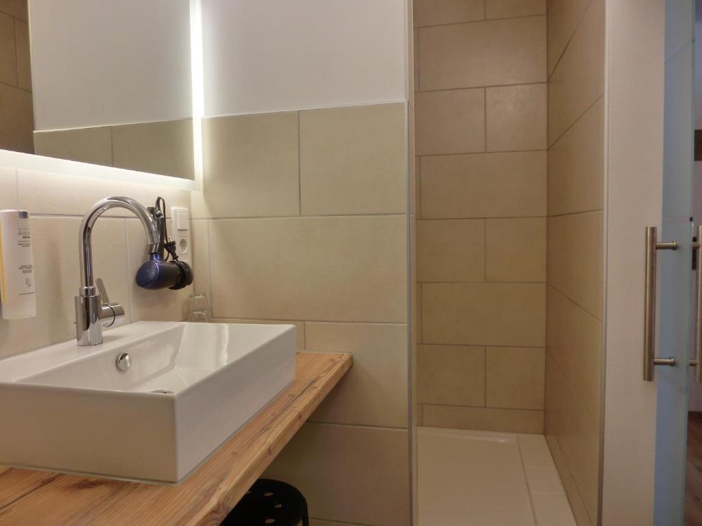 Koupelna v ubytování Aparthotel Buchauer-Tirol