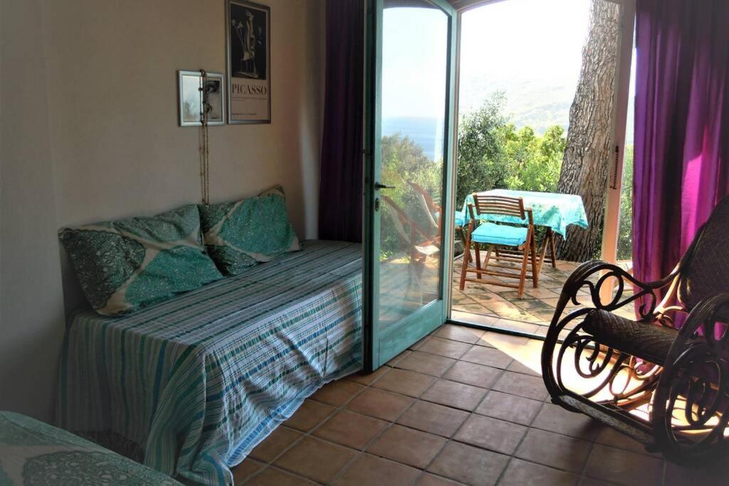 Rúm í herbergi á MINI SUITE ULIVO