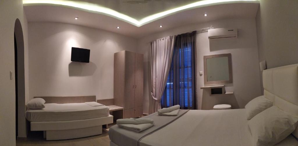 Postel nebo postele na pokoji v ubytování Hotel Paraktio