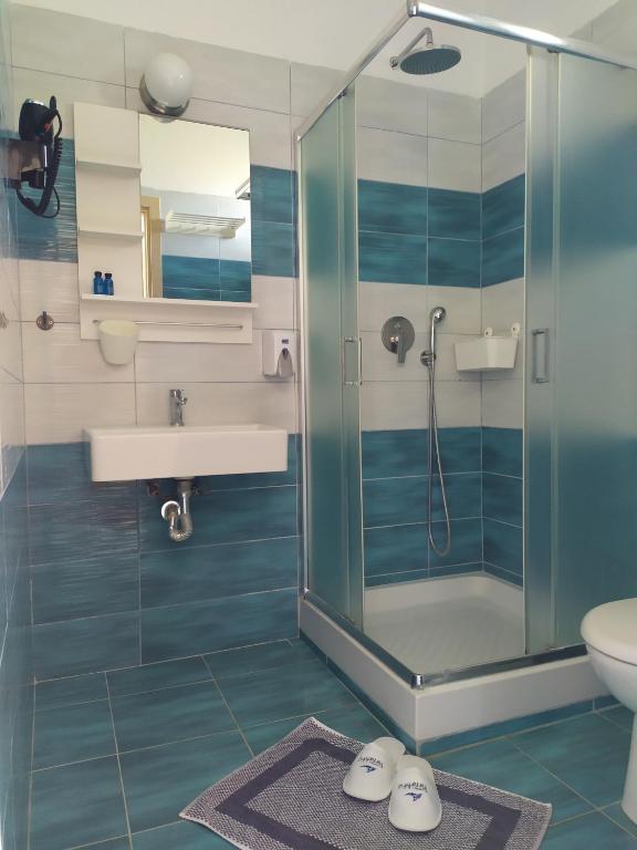 Koupelna v ubytování Hotel Paraktio